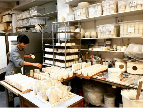 Namiko glazing in the studio